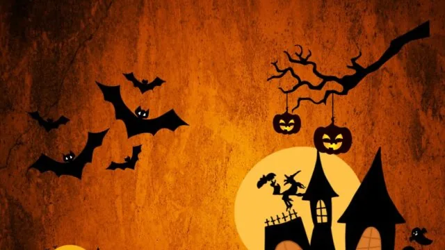 Halloween scene with jack-o’-lanterns, bats, a witch flying on a broom, haunted houses, leafless trees, and a full moon on an orange background.